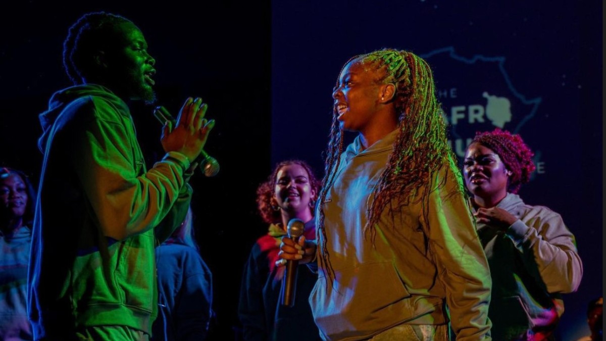 Group photo of Afro-Music Collective members singing