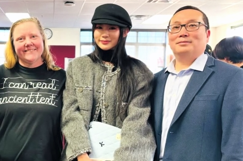 Qiana Hao with ELI instructor, Leslie Connery, and another student at graduation.