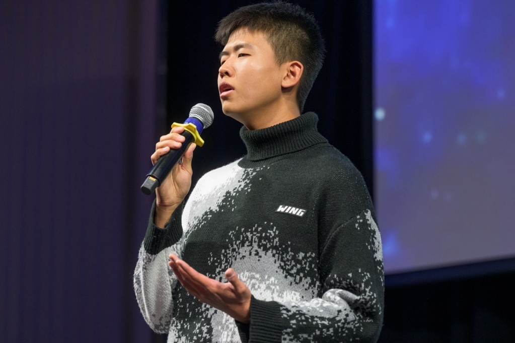 An ELI student performs a song in Chinese at the Festival of Nations.