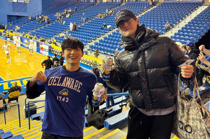 Attending a UD basketball game.