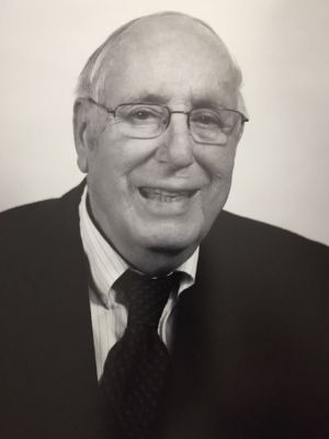 Black and white headshot photo of Stuart Sharkey