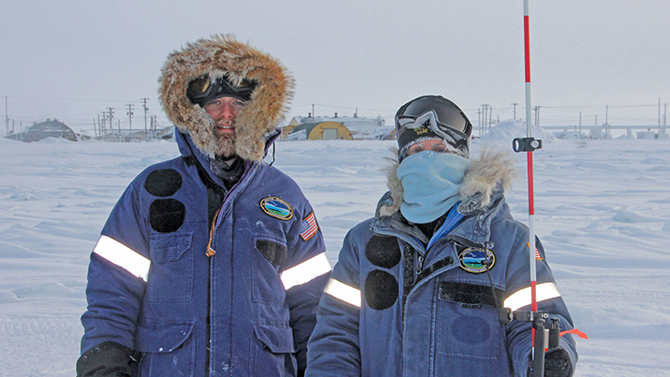 UD CEOE Researchers (Renny Kane, left, MS graduate Student and Tracy DeLiberty, right)in Barrow, Alaska measuring arctic sea ice. Merlin Team with Cathy Geiger
