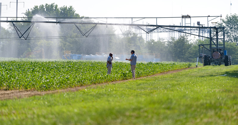 Yan Jin (red shirt), professor of Plant and Soil Science , and Wenjuan Zheng, a Post-Doctoral researcher in Plant and Soil Science, are co-authors on a pager with colleagues Saiqi Zeng, Harsh Bais, Jacob M. LaManna, Daniel S. Hussey, and David L. Jacobson titled "Plant Growth-Promoting Rhizobacteria (PGPR) Reduce Evaporation and Increase Soil Water Retention". The study looks at using Bacillus subtilis strain UD1022 (identified and patented by researchers from College of Agriculture and Natural Resources) to improve water retention in soil and reduce hydraulic conductivity and accumulative evaporation. - (Evan Krape / University of Delaware)