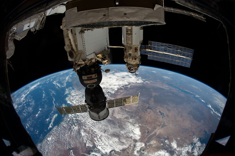 iss065e214029 (Aug. 2, 2021) --- Russia's "Nauka" Multipurpose Laboratory Module is pictured docked to the Zvezda service module's Earth-facing port as the International Space Station orbited 262 miles above the Kenya-Tanzania border on Africa's Indian Ocean coast. In the foreground, is the Soyuz MS-18 crew ship docked to the Rassvet module.