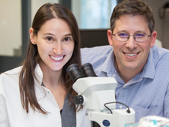 Professor Jonathan Cohen working in research lab with student.