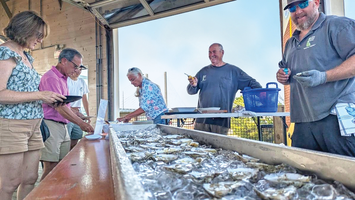 Delaware Inland Bays oyster growers show off their product during Inland Bays Oyster Week.