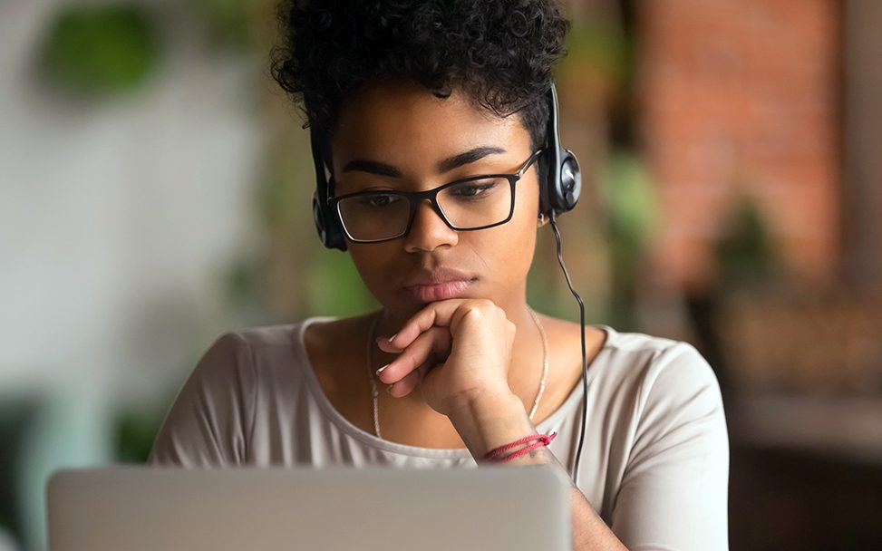 Student looking at laptop