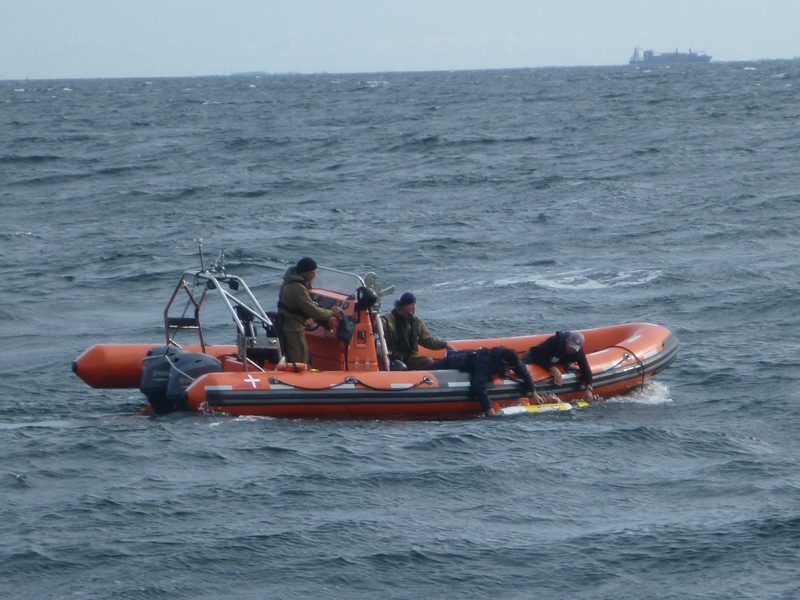 Students in boat on Delaware Bay