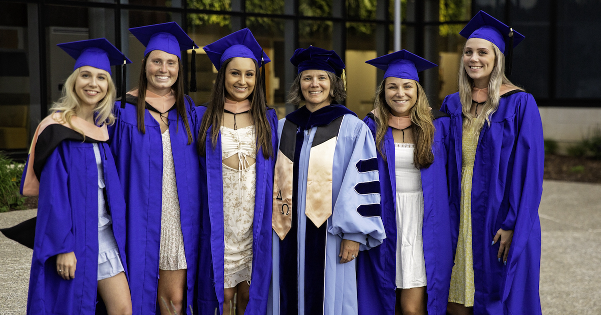 Epidemiology’s first graduating class. Graduates pose with department chair Jen Horney.Epi