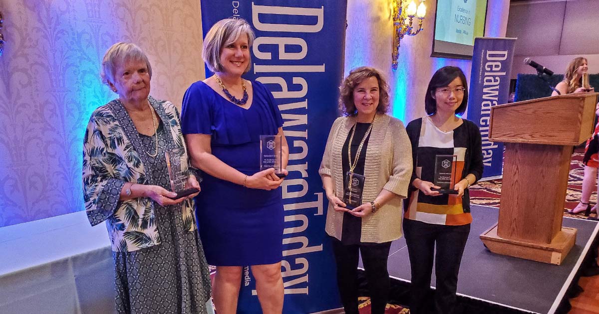 Evelyn Hayes, Jennifer Korkosz, Kathleen Brewer-Smyth, and Xiaopeng Ji showcase their honorary Top Nurses of 2022 awards. 