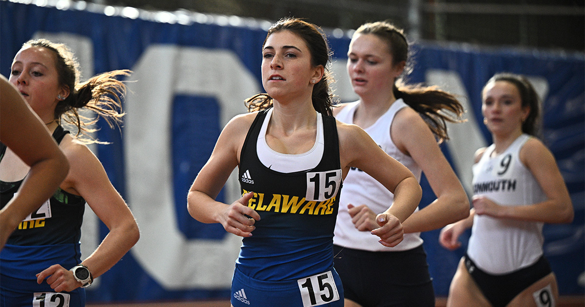 Student-athlete Anna Cleary running in a meet.
