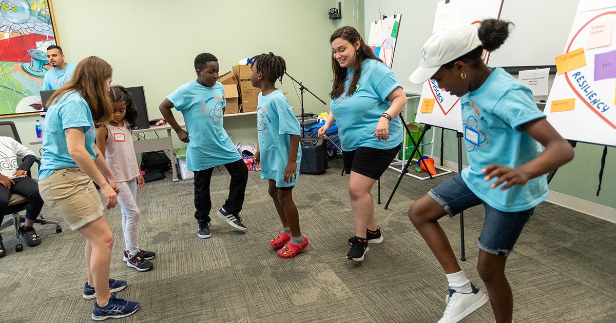 Children who stutter are dancing as part of a summer camp that mixes fun with therapies to help them become effective communicators.