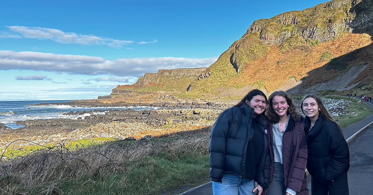 From left to right, UD nursing students Abigail Chiappone, Lauren Maransky and Paige Beam visit Giants Causeway, a World Heritage Site in Northern Ireland, on a beautiful, sunny day.