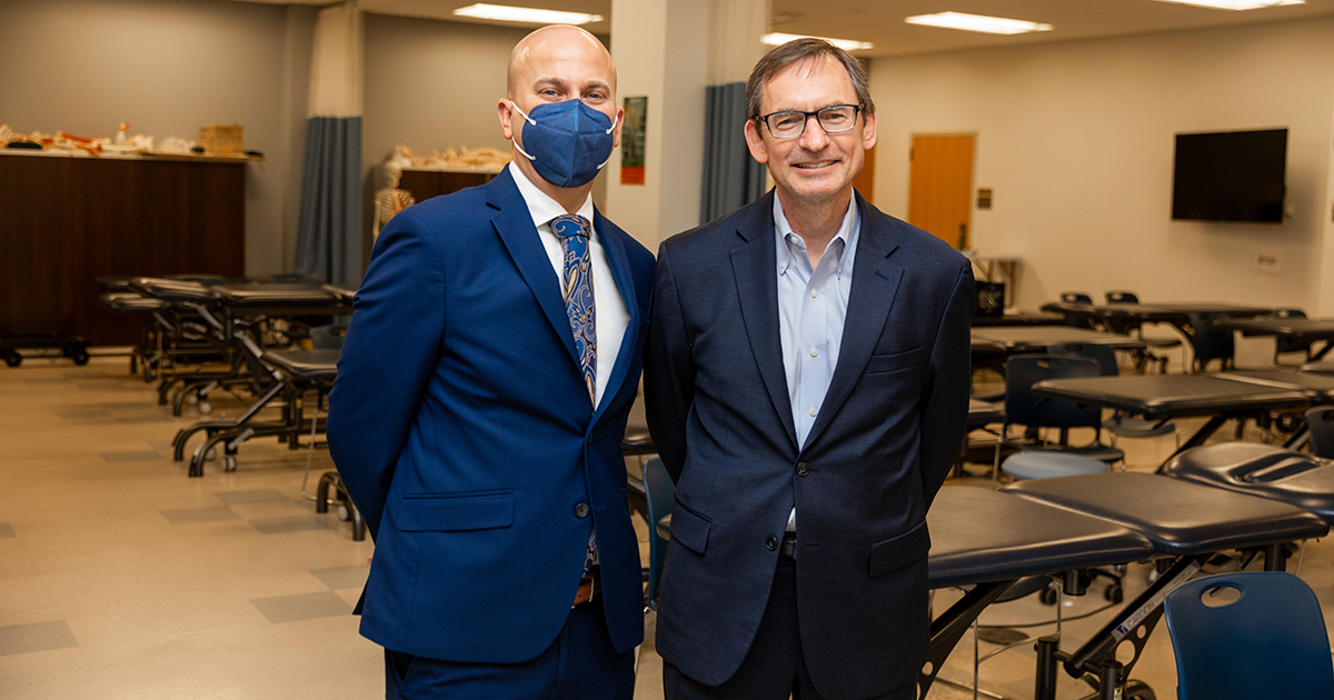 Highmark president Nick Moriello, who served as Dean for the Day, poses with CHS Dean Bill Farquhar.