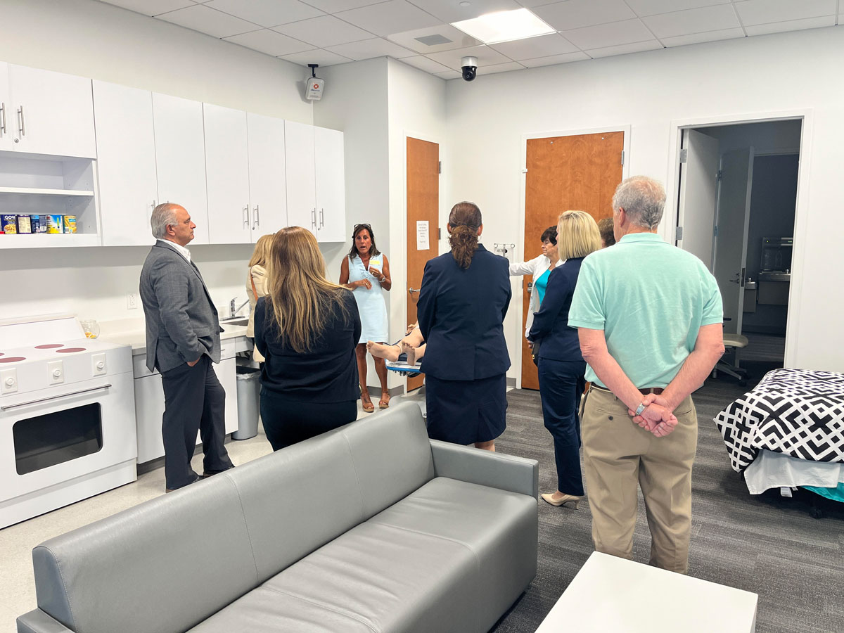 CCSU executive leadership tours UD CHS simulation spaces.