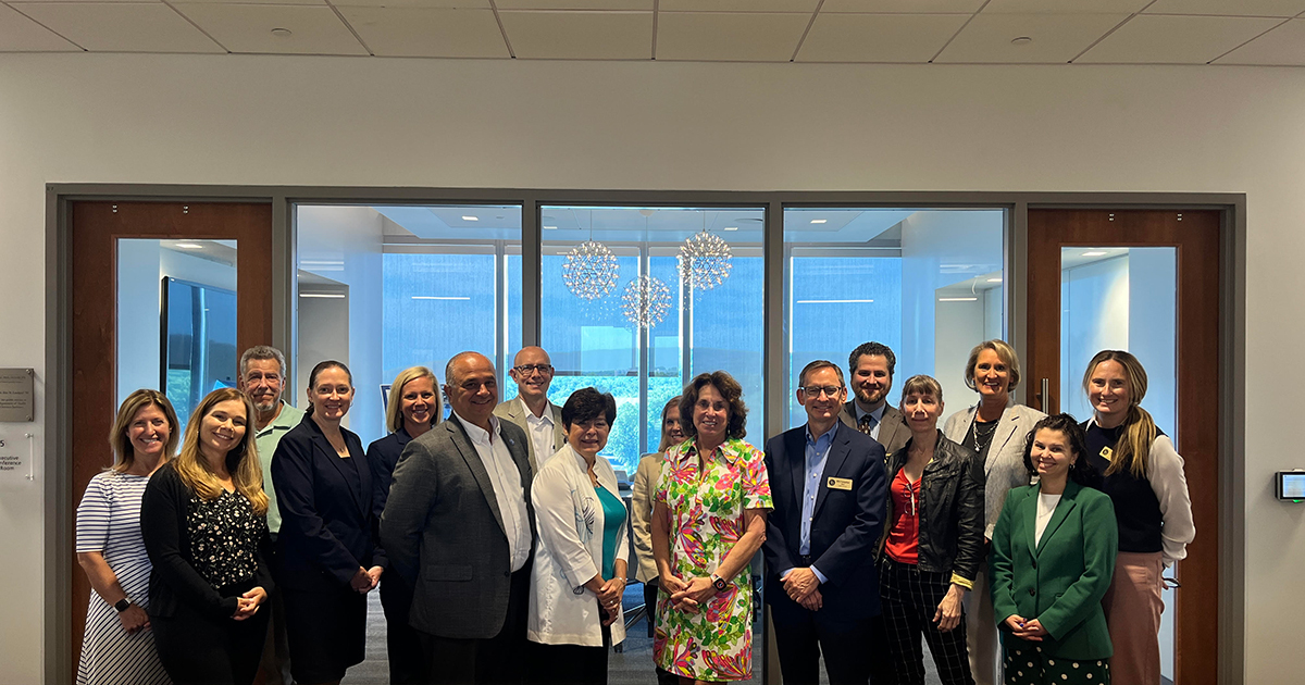 The executive team from Central Connecticut State University poses with the CHS executive leadership team during a visit to campus. 
