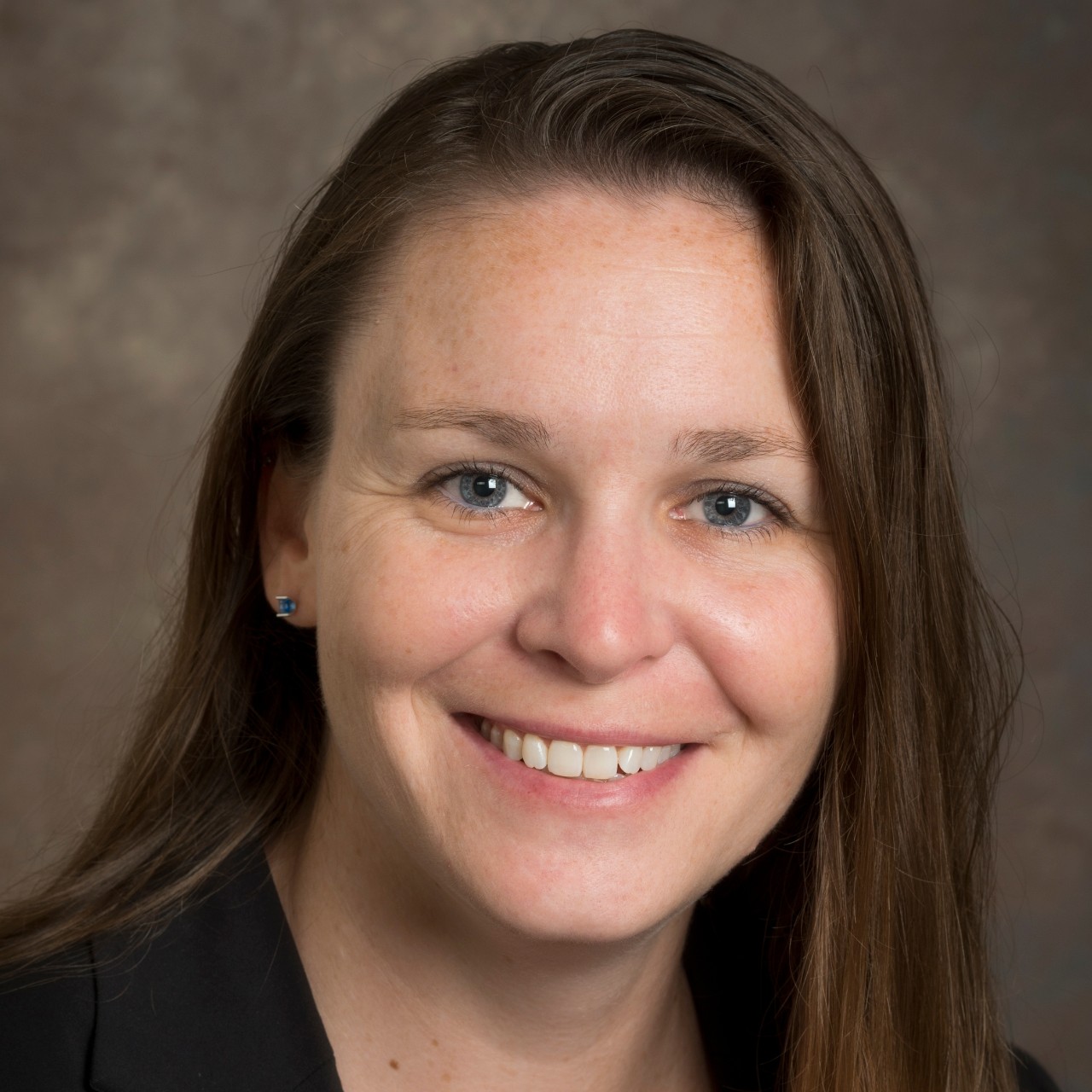 Headshot of Jennifer Graber Woman posing for headshot