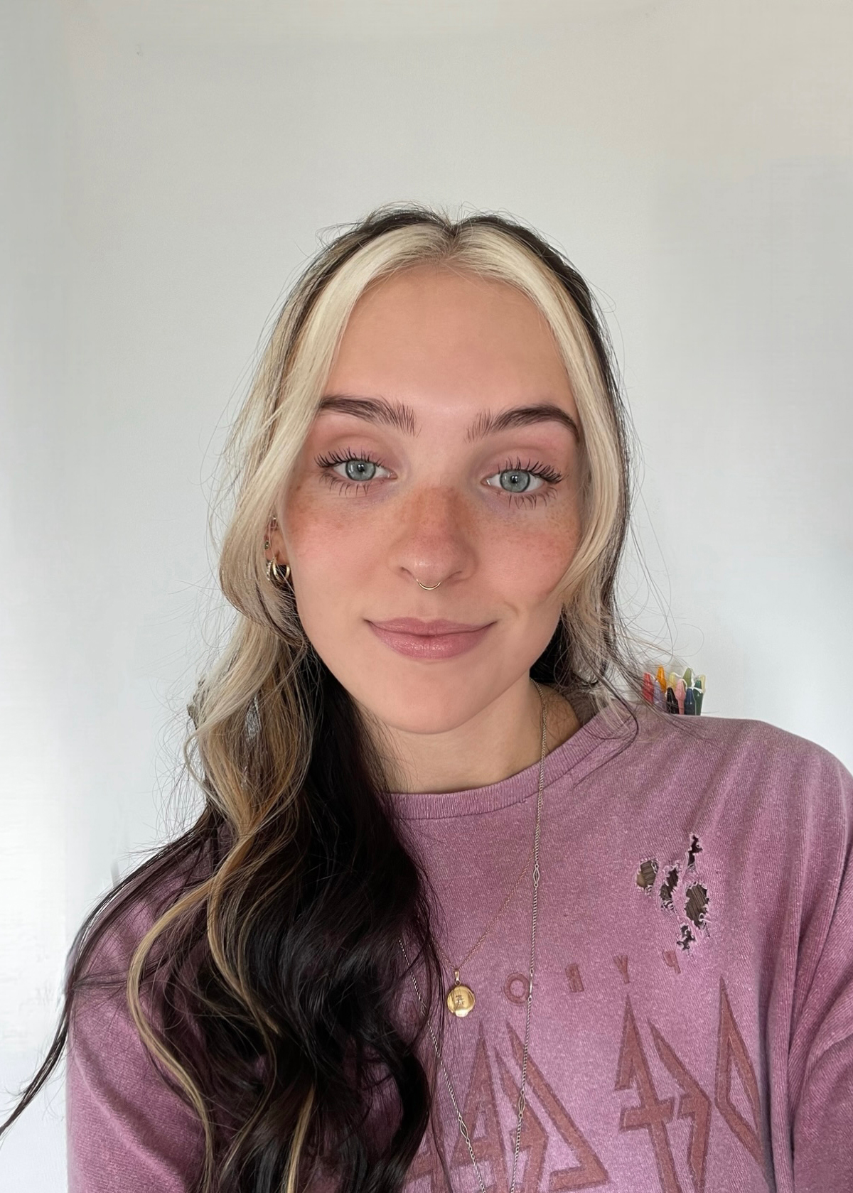 Amanda McFall, a senior medical diagnostics major with a pre-PA concentration, poses wearing a rose-colored sweatshirt in this submitted photo.