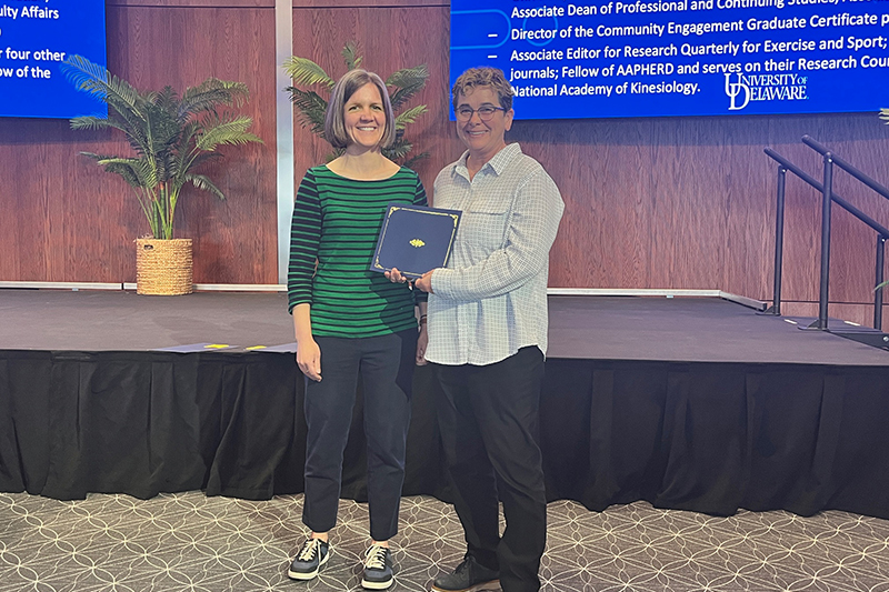 Nancy Getchell (right), Professor of Kinesiology and Applied Physiology (KAAP), received the Excellence in Service Award. Here, she poses with Jocelyn Hafer, Assistant Professor of KAAP and CHS Awards Committee member.