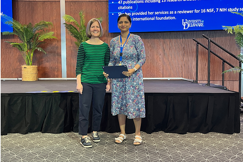 Mona Batish (right), Associate Professor of Medical and Molecular Sciences, took home the Excellence in Research (Associate/Full Professor) Award. Here, Batish poses with Jocelyn Hafer, Assistant Professor of KAAP and CHS Awards Committee member.