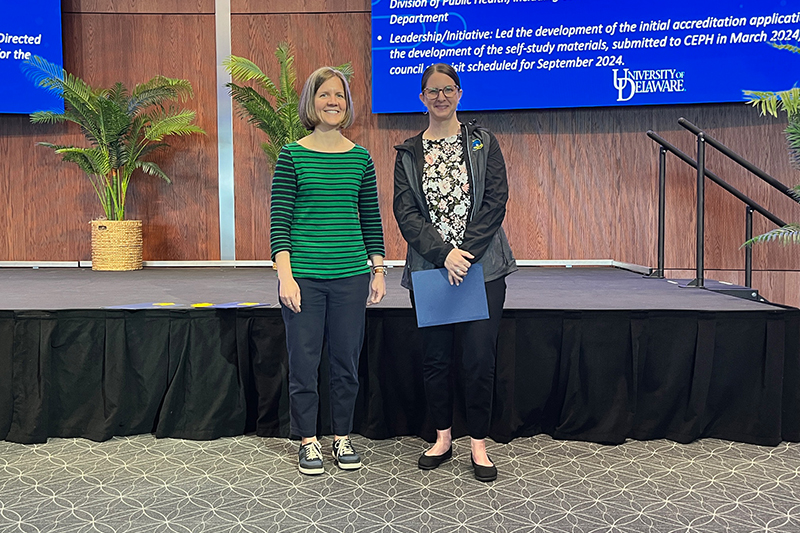 Lauren Camphausen (right), Assistant Director of the Master of Public Health in Epidemiology, won this year's Excellence in Clinic/Academics (Staff) Award. Here, Camphausen poses with Jocelyn Hafer, Assistant Professor of KAAP and CHS Awards Committee member.