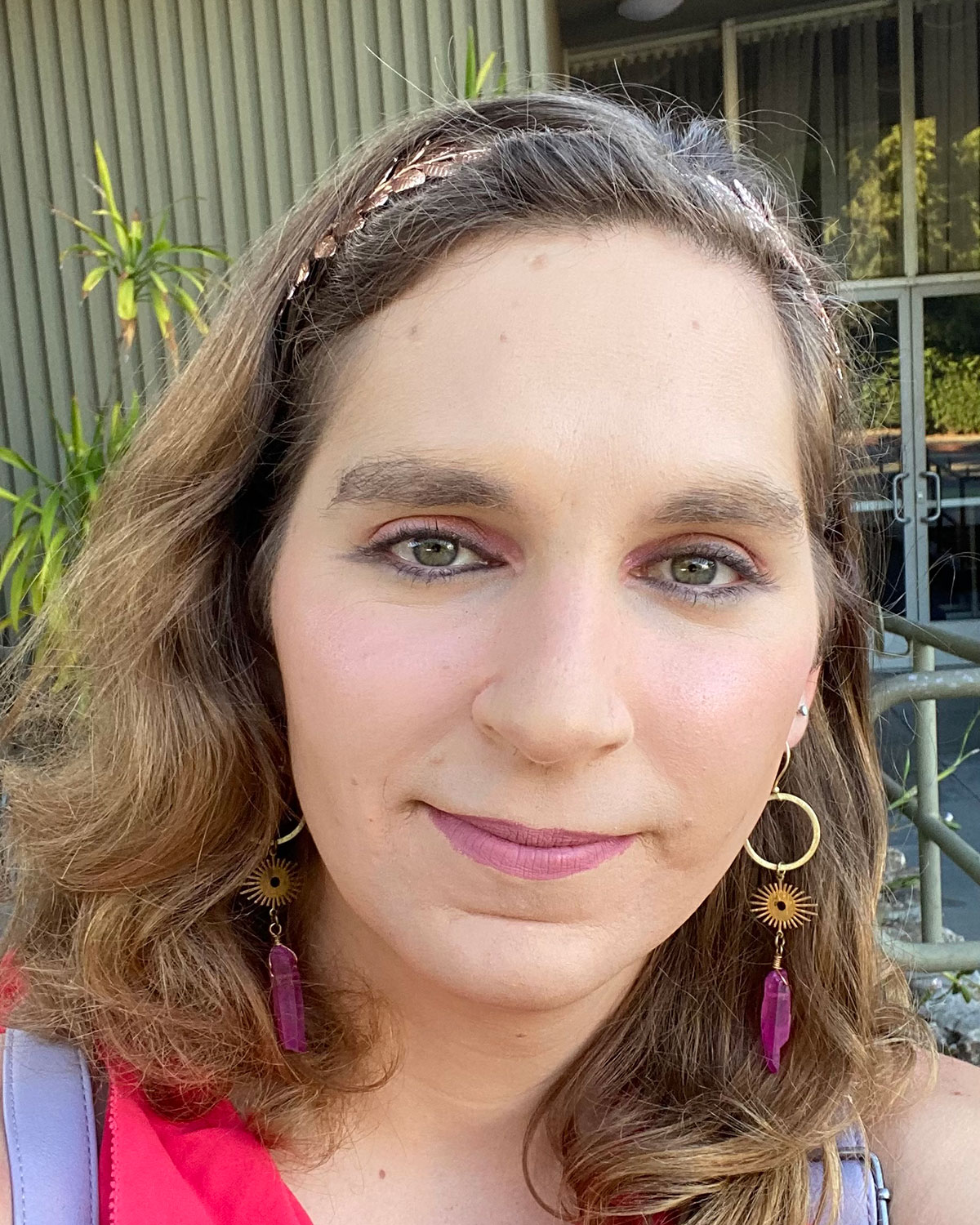 A headshot or selfie of Juliet Moore outside.
