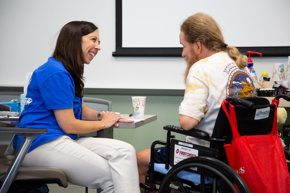 Speech Language Pathologist talking in a session with a patient