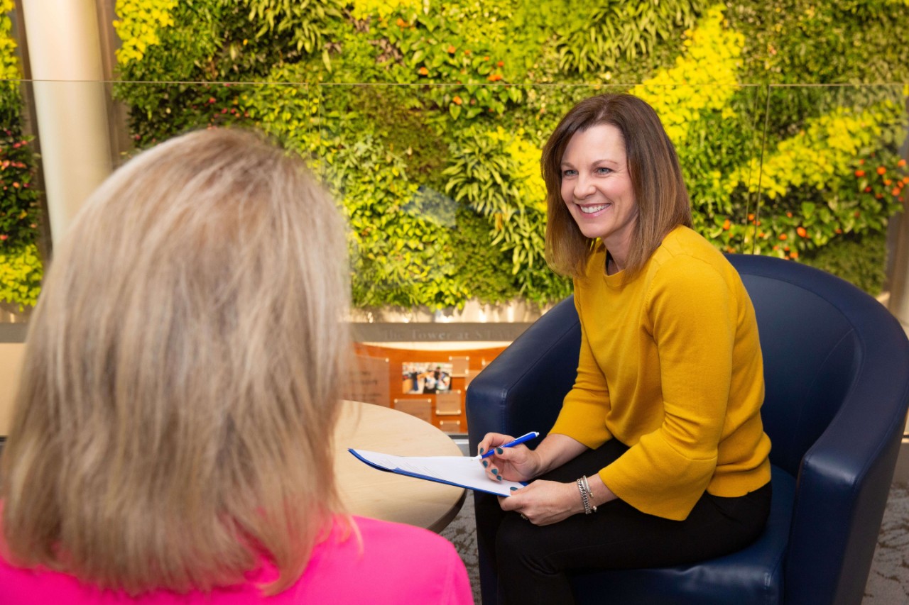 two women participate in clinical health coaching session