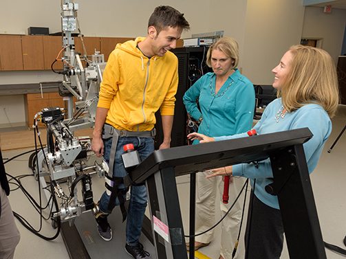 Fabrizio Sergi, assistant professor of Biomedical Engineering, along with is colleagues Jill Higginson, associate professor of Mechanical Engineering / director of the Center for Biomechanical Engineering Research / associate director of Biomedical Engineering, and Darcy Reisman, associate professor of Physical Therapy, in the Human Robotics lab in the Health Sciences Complex at UD's STAR Campus. One of the areas of research the group is studying is the use of wearable robotics to assist stroke patients in gait training as part of their physical therapy. - (Evan Krape / University of Delaware)
