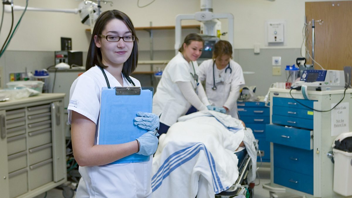 Students working at the Christiana Hosptial simulation labs.