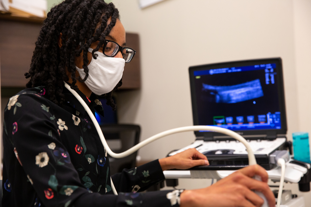 Student using an ultrasound machine