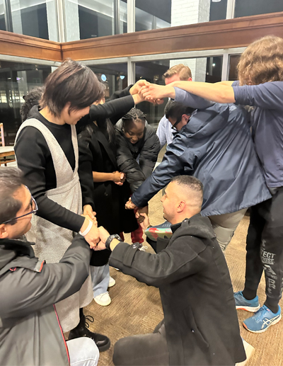 Graduate student at a game night event