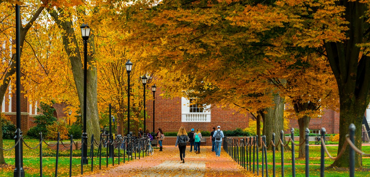 Scene of students walking on the UD main campus during fall.