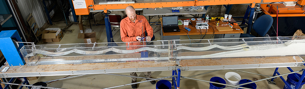 Civil Engineering Professor of Civil and Environmental Engineering studies how sand dunes erode during extreme waves and storm surges with a wave plume.