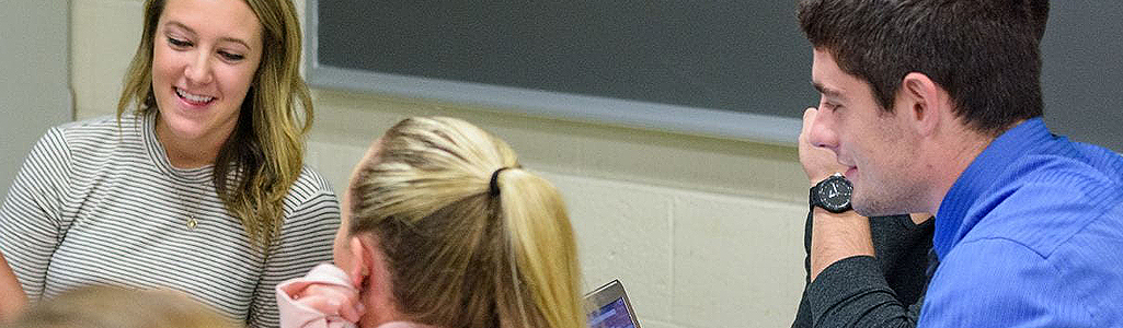 Health Promotion students in a classroom during student presentations of teaching methods.