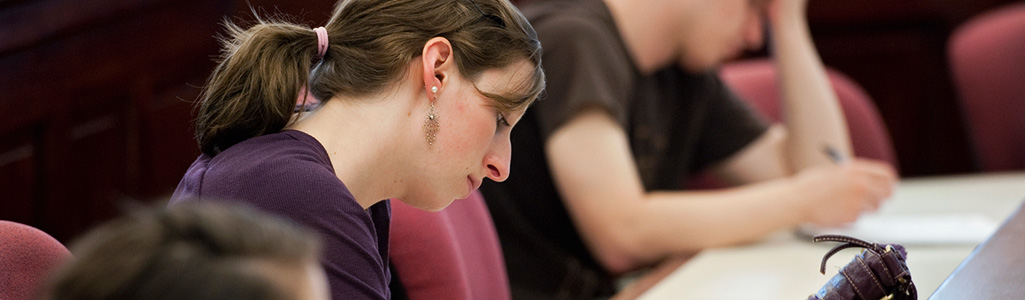Business administration student as she works in class.