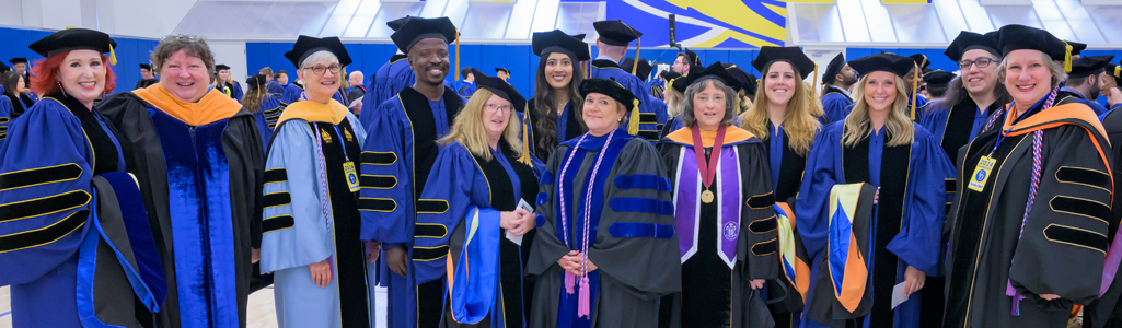 The Class of 2024 Doctoral Hooding Ceremony, held on May 22nd in the Bob Carpenter Sports and Convocation Center with UD President Dennis Assanis, Provost Laura Carlson, Dean of the Graduate College Louis F. Rossi, Dr. Mary Martin, and Deans and representatives of the colleges in attendance.