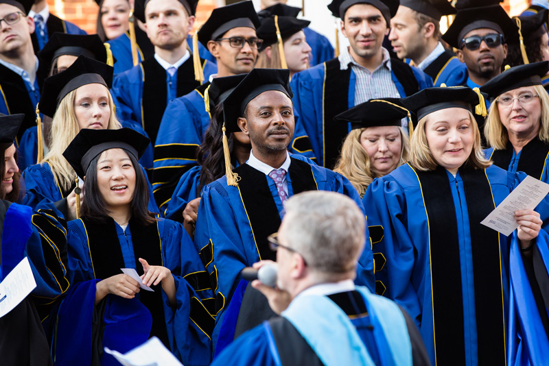 Doctoral Hooding 2018 University of Delaware students at graduation.