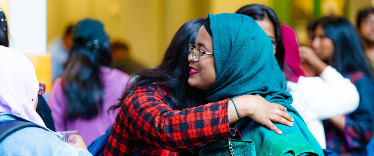 International students and scholars join staff at International Coffee Hour