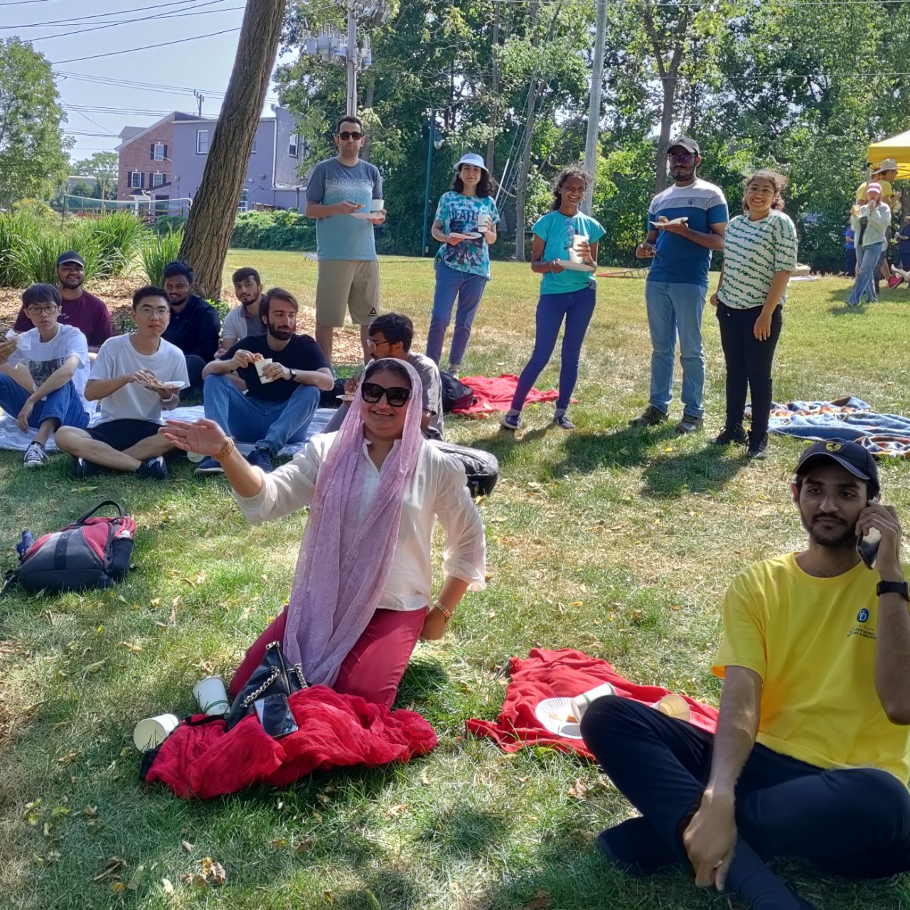 A photo of students and a dog