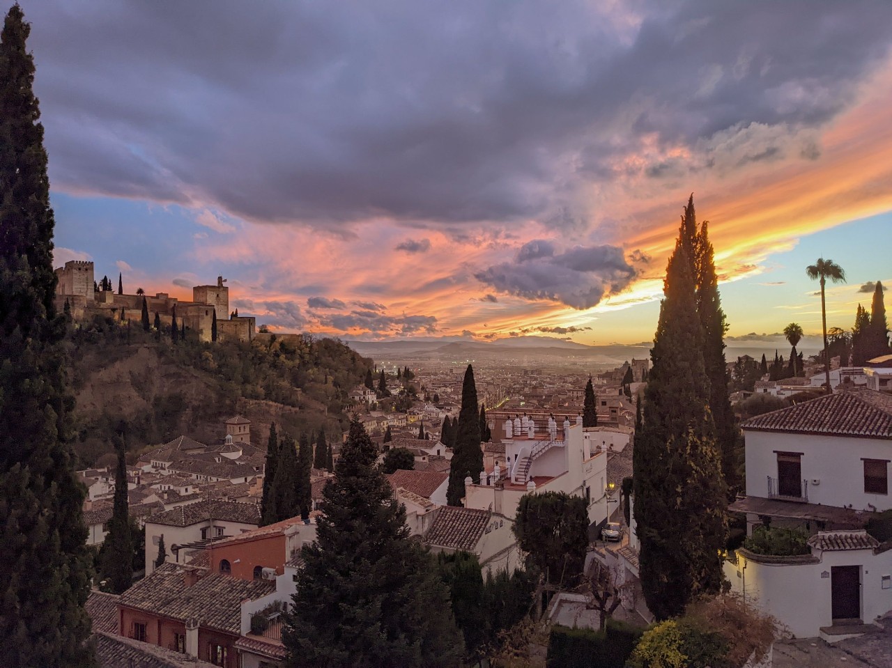 a view out a window of a european town
