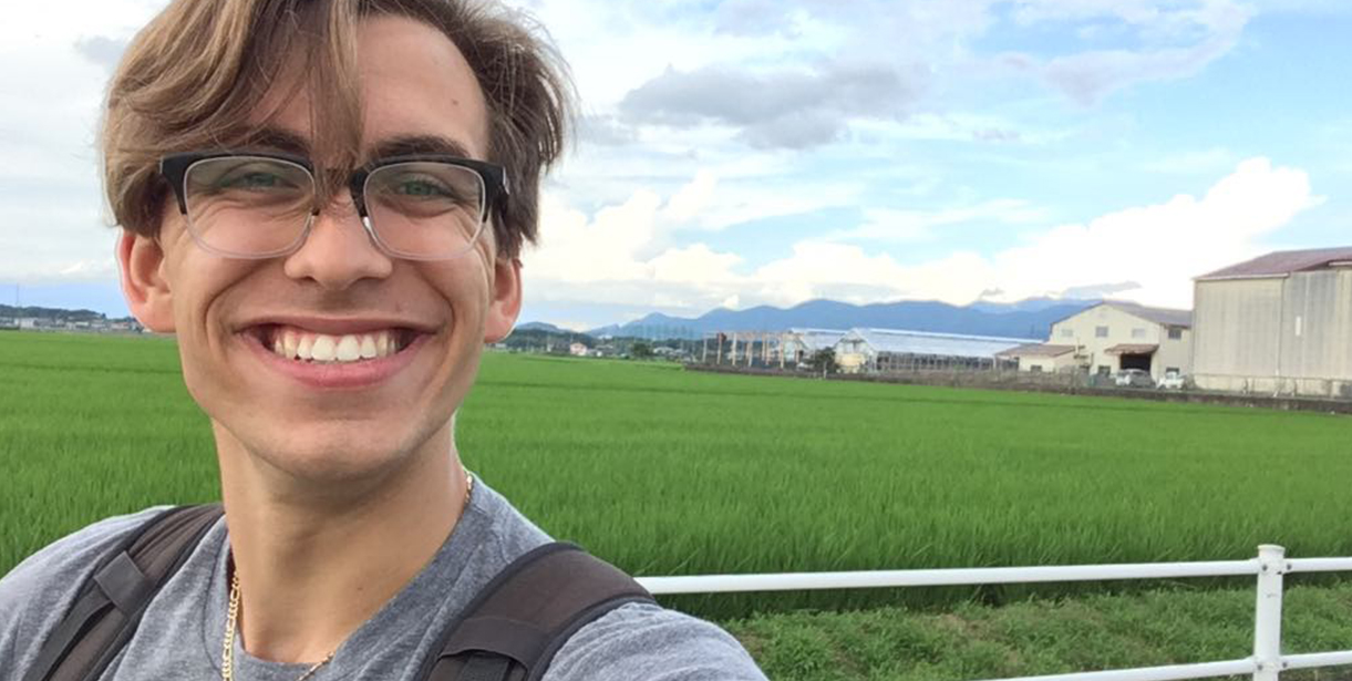 Rickey Egan smiles for a selfie during his CLS program in Japan.