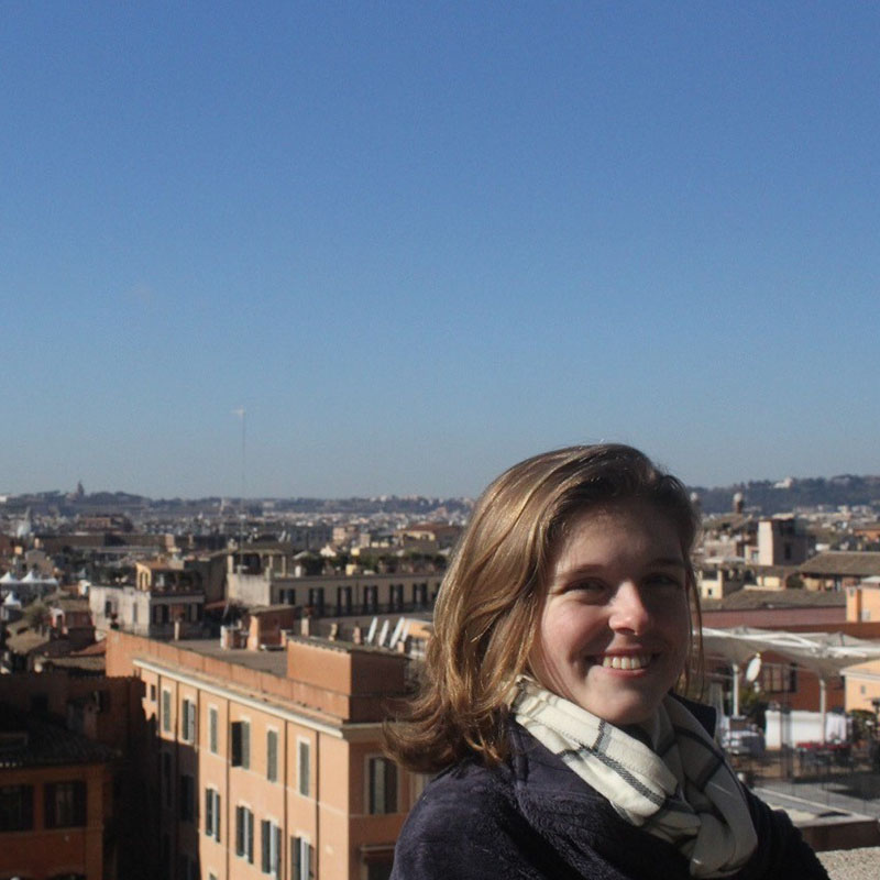 Caitlin Rulli stands for a photo overlooking Rome