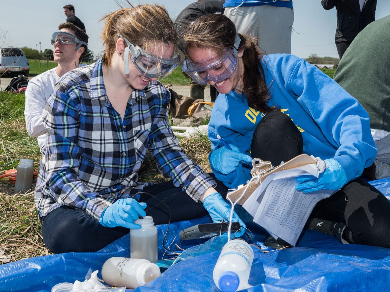 Two students doing field research