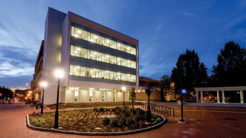 Photograph of Purnell Hall at night.