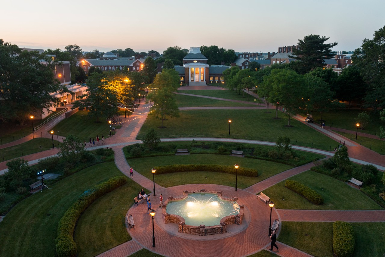 Bird's eye view image from a drone of the University of Delaware campus at dusk.  