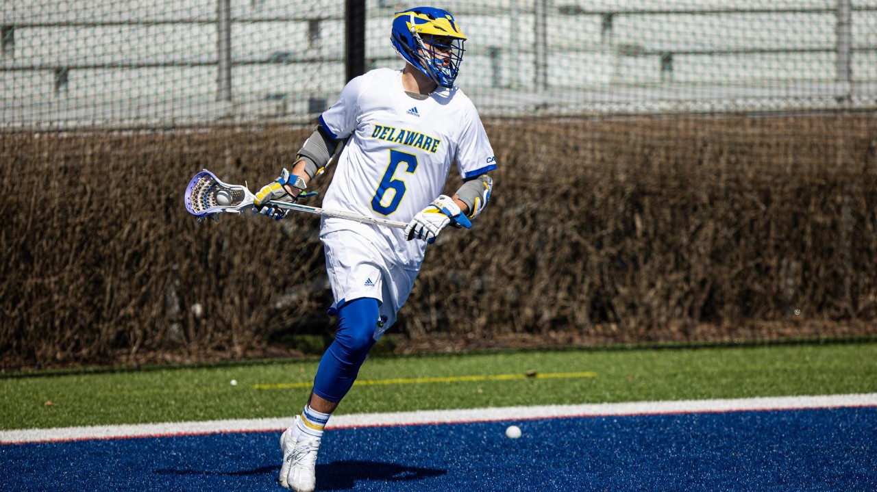  A lacrosse player on the field. 
