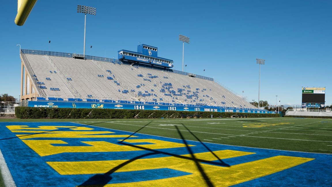 Blue Hens Forever video conferencing background graphic.