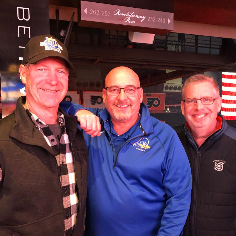 Fil Sherry (center) with former UD Hockey teammates Jim Dewson, BE81 (left) and Tom Wick, BE84 (right) at UD Hockey Alumni Night at the Flyers Fil Sherry (center) with former UD Hockey teammates Jim Dewson, BE81 (left) and Tom Wick, BE84 (right) at UD Hockey Alumni Night at the Flyers