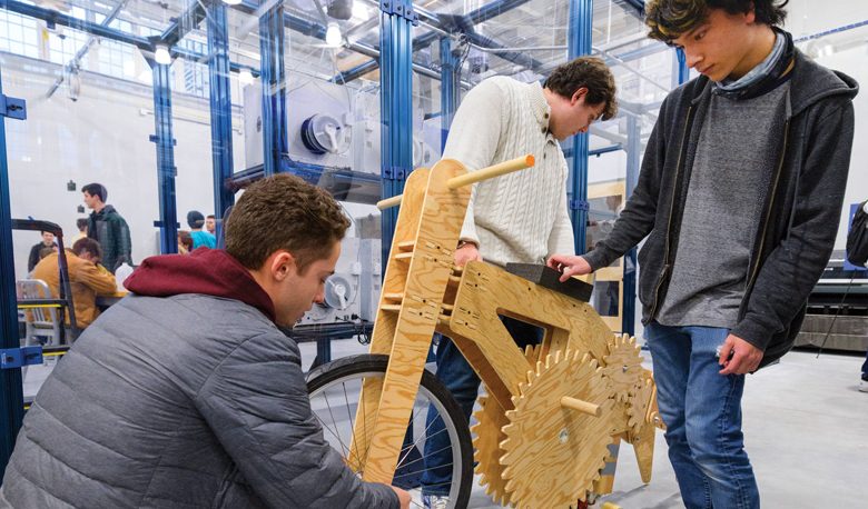 COE-MEEG210-Wooden_Frame_Bicycles-120419 Students in the Statics (MEEG210) mechanical engineering course are partnering with Newark’s "Wooden Wheels" bike shop to design and manufacture wooden frame bikes. The 160 students in the course, working in teams of four, consulted with the owners of Wooden Wheels on their bike frame designs and then utilized the Design Studio in Spencer Lab to make the frames. This gave them a real-world opportunity to apply their newly acquired knowledge in Statics, a branch of mechanics.